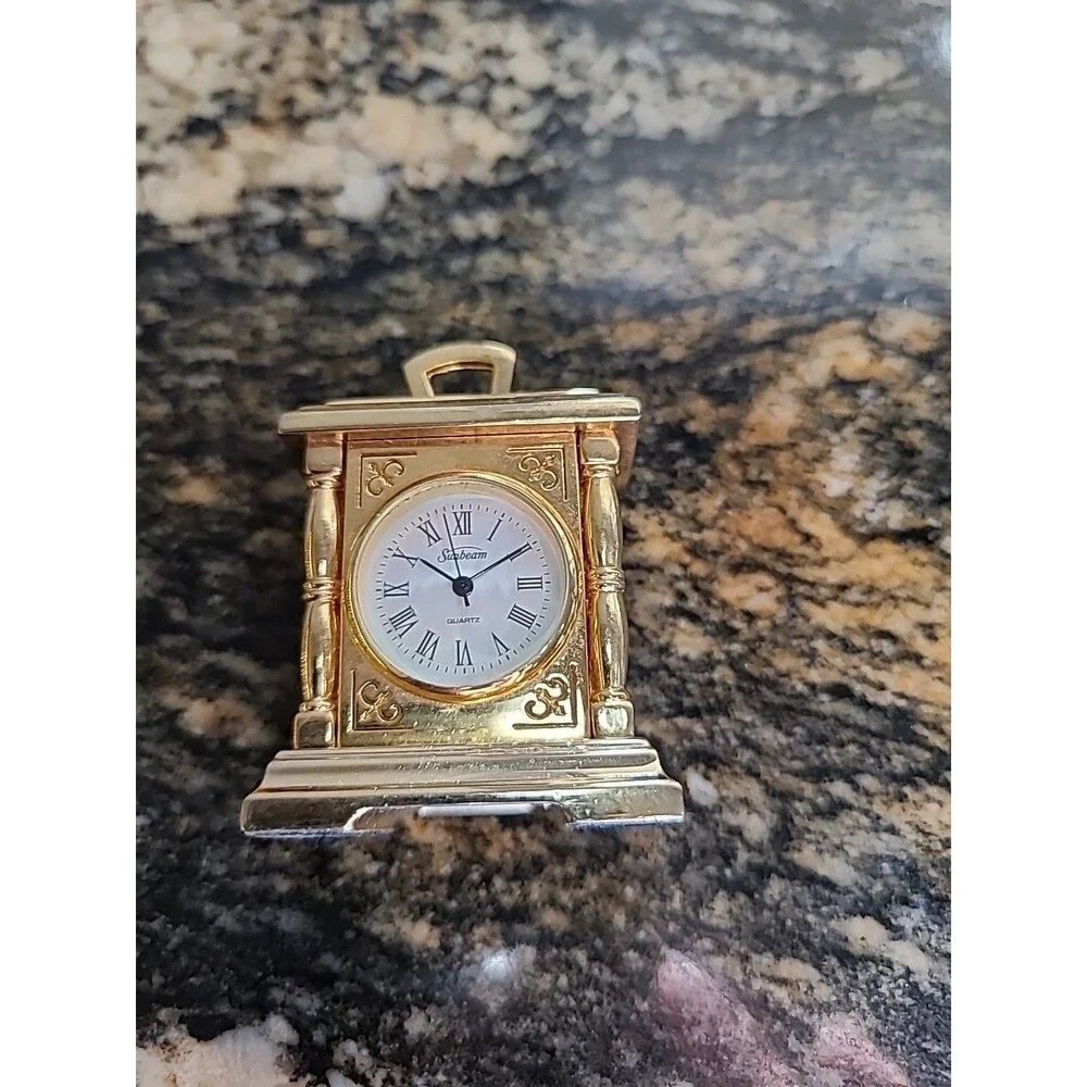 Mini Sunbeam Mantle Clock needs batteries